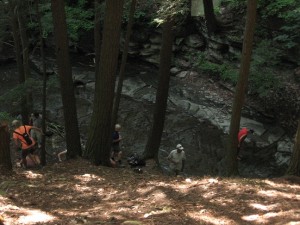 The two groups meet at the waterfall.